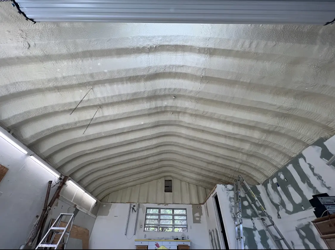 Spray polyurethane foam applied to the underside of a metal roof deck in Safety Harbor